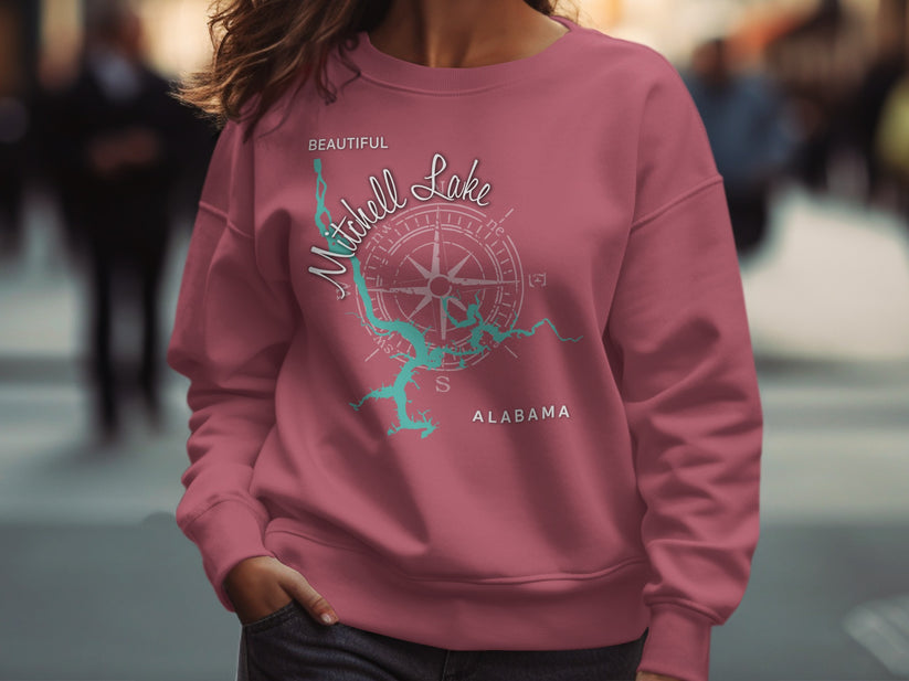 Pink sweatshirt with a teal compass rose map of Mitchell Lake, Alabama.