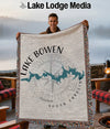 Throw blanket with Lake Bowen South Carolina map, compass, and fringed edges.