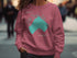 Burgundy sweatshirt with "Little Turtle Lake" and a teal lake map.
