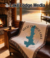Woven blanket with West Okoboji Lake map design and "Iowa" text.