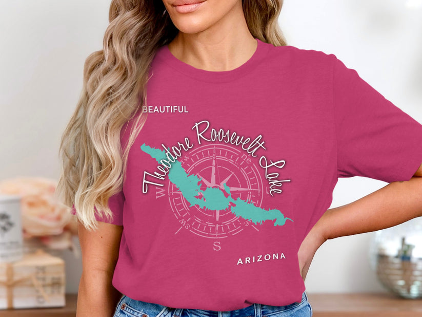 Teal Theodore Roosevelt Lake graphic on a pink t-shirt.