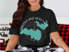 Black t-shirt with "Brooks and Hess Lake Michigan" and compass graphic.
