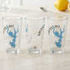 Three clear pint glasses with a blue map of Moss Lake, NC and compass rose design.