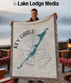 Woven blanket with Key Largo, Florida map and compass design.