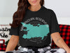 Black t-shirt with turquoise Manasquan Reservoir map graphic and "New Jersey" text.