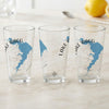 Three clear glasses with blue Lake Waco map and compass design.