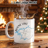 White mug with "Boone Lake Tennessee" and compass design, steamy coffee splash.