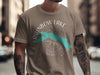 T-shirt with 'Rainbow Lake Maine' text and compass graphic.