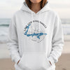 White hoodie with Lake Ossiwinne Maegee Minnesota map and compass design.