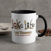 White mug with black trim features "Lake Life" and "Lake Winnisquam New Hampshire" text.