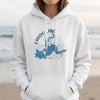 White hoodie with Caddo Lake Texas map and compass graphic.
