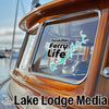 Sticker on a boat window reads "Tenkiller Ferry Life" with lake outline.