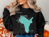 Black sweatshirt with "Lake Stevens Washington" map graphic and compass rose.