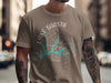 Brown t-shirt with Lake Shasta California graphic and compass design.