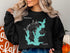 Black sweatshirt with "Love Lake Texas" graphic and compass rose.