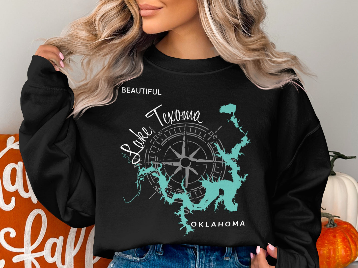Black sweatshirt with a compass and map of Lake Texoma, Oklahoma.