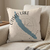 Otisco Lake New York map and compass design on a cream pillow.