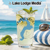 Glass with Lake Pend Oreille map and "IDAHO" text on beach background.