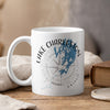 White mug with Lake Charleston map and compass design, Ontario.