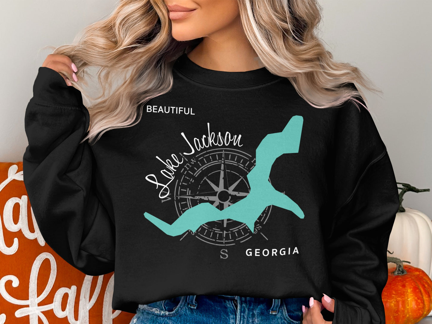 Black sweatshirt with "Beautiful Lake Jackson Georgia" and compass rose map.