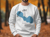 White sweatshirt with a blue Pearl Lake Wisconsin graphic and compass rose.
