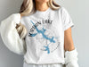 White t-shirt with Jordan Lake, Alabama map and compass graphic.