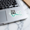 Sticker with "Tims Ford Life" text and teal lake outline on a laptop.