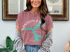 Nantahala Lake silhouette with compass and "North Carolina" text on pink t-shirt.