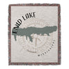 Woven throw blanket with Enid Lake Mississippi map and compass rose design.