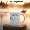 White mug with "Saguaro Lake Arizona" and compass design on lake background.