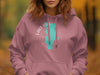 Pink hoodie with teal Lake Piru outline and compass graphic.