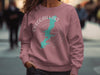Oologah LakeOklahoma map and compass design on mauve sweatshirt.