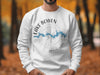 White sweatshirt with Lake Bowen South Carolina graphic and compass rose.