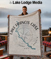 Fringed woven blanket with Lake Francis Case map and compass design.