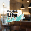 Key West Life sticker with a teal outline of islands and a copyright notice.