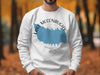 White sweatshirt with Lake McConaughy Nebraska graphic and compass details.
