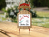 Wooden sled ornament with "Merry Christmas From Cherokee Lake" text.