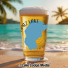Glass of beer on beach with "SPAZ LAKE" and California outline overlay.