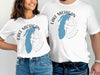 White t-shirts with Lake Michigan map graphic and compass design.