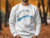 White sweatshirt with blue Buckeye Lake map and compass graphic.