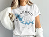 White t-shirt with blue Lake Tobesofkee map and compass design, Georgia.