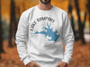 White sweatshirt with blue Lake Rampart Colorado graphic and compass rose.