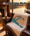 Woven blanket with Grenada Lake, Mississippi map and compass design.
