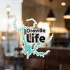 Oroville Life sticker in teal over a lake map outline with minimal text