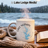 White mug with "Lake Norman North Carolina" and compass design, steaming hot.