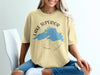 Yellow t-shirt with Lake Superior map and compass design, text reads "LAKE SUPERIOR" and "ONTARIO".