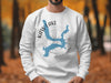 White sweatshirt with Kaw Lake Oklahoma map and compass graphic.