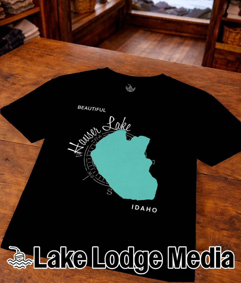 Black t-shirt with "Beautiful Hauser Lake Idaho" and lake outline graphic.