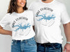 White t-shirts feature "Lake Ouachita Arkansas" with a blue lake map and compass graphic.