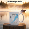 White mug with "Lake Las Vegas Nevada" and compass graphic on waterfront.